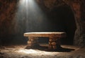 Stone Bench in Dark Cave Illuminated by Light Beam Royalty Free Stock Photo
