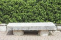 Stone bench in the garden Royalty Free Stock Photo