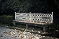 Stone bench with iron backrest