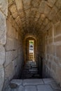 Stone block hallway with vaulted ceiling and granite stairs to the Moorish citadel of Merida. Province of Badajoz, Extremadura,