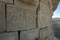 Stone blocks with Arabic script located on an exterior wall of Shobak Castle in Jordan.