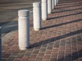 Stone Bollards on street City Pathway Public walkway