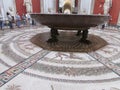 Stone bowl and mosaic floor with scenes of ancient life, Vatican Museum, Rome, Italy.