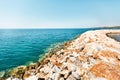 Stone breakwater in harbor in Greece