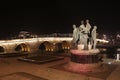Stone Bridge and Boatmen of Thessaloniki Statue at night Royalty Free Stock Photo