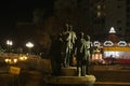 Stone Bridge and Boatmen of Thessaloniki Statue at night Royalty Free Stock Photo