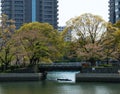 Stone Bridge Cross The Pond InThe Park in Middle of City Royalty Free Stock Photo