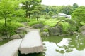 Stone bridge, Japanese pavilion, Pinus thunbergii tree