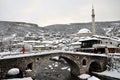 Stone Bridge and old part of Prizren under the fortress, covered with snow