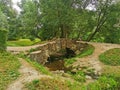 stone bridge over the pond Pavlovsk park summer day