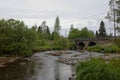 Stone bridge over river. Royalty Free Stock Photo