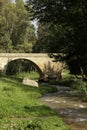 Stone bridge over the river V Royalty Free Stock Photo