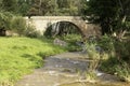 Stone bridge over the river Royalty Free Stock Photo