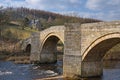 Stone bridge over River Wharfe Royalty Free Stock Photo