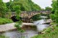 Stone Bridge over River Wharfe near Kettlewell, Wharfedale, Yorkshire Dales, England, UK Royalty Free Stock Photo