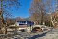 Stone bridge over small river in Moushteni near Kavala, Greece Royalty Free Stock Photo