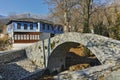 Stone bridge over small river in Moushteni near Kavala, Greece Royalty Free Stock Photo