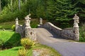 Stone bridge in the park. Royalty Free Stock Photo