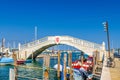 Stone bridge Ponte di Vigo across Vena water canal in historical centre of Chioggia