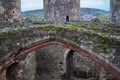 Stone bridge with two pidgeons in Conwy Castle, an ancient 13th Century stone built fortification in North Wales