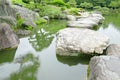 Stone bridge, water pond in Japanese zen garden Royalty Free Stock Photo