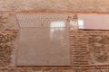 Stone brown medieval building facade in Segovia, Spain, with geometrical shapes and lines