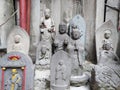 Stone Buddha statues and gods in the temple.