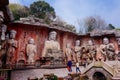 Stone Buddha on the stone wall at Wuxi Yuantouzhu - Taihu scenery garden, China.