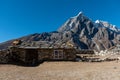 Stone built cabin with a beautiful view of the snowcapped mountain