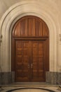 A stone-built carriage porch door surrounded by a stone structure in the Peace Palace, Vredespaleis in Dutch Royalty Free Stock Photo