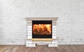 Stone burning fireplace in bright empty living room interior of house Royalty Free Stock Photo