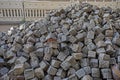 Stone burshtka piled up before a sidewalk resurfacing Royalty Free Stock Photo
