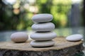 Stone cairn on green blurry background Royalty Free Stock Photo