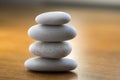 Stone cairn tower, poise stones, rock zen sculpture, light white pebbles