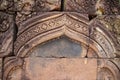 Stone carved bas-relief of Banteay Srei temple in Angkor Wat, Cambodia. Decorative bas-relief on cambodian hindu temple.