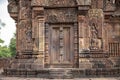 Stone carved bas-relief of Banteay Srei temple in Angkor Wat, Cambodia. Devata figures and floral ornament bas-relief. Royalty Free Stock Photo