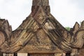 Stone carved bas-relief of Banteay Srei temple in Angkor Wat, Cambodia. Gate roof relief with floral ornament bas-relief