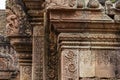 Stone carved bas-relief of Banteay Srei temple in Angkor Wat, Cambodia. Traditional bas-relief on cambodian hindu temple Royalty Free Stock Photo