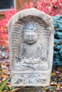 Stone carved Buddha statue in the Lotus Pose