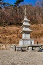 Stone carved Buddhist four story pagoda