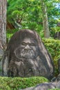 Stone carved Daruma in a rock of Shuzenji Temple Shuzen-ji