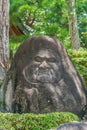 Stone carved Daruma in a rock of Shuzenji Temple Shuzen-ji