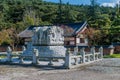 Stone carved dragons atop turtle