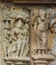 Stone carved erotic bas relief in Hindu temple in Khajuraho, India. Royalty Free Stock Photo