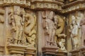 Stone carved erotic bas relief in Hindu temple in Khajuraho, India. Royalty Free Stock Photo