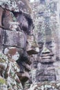Stone carved faces at the wall of the Bayon temple in Siem Reap, Cambodia.