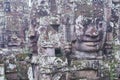 Stone carved faces at the wall of the Bayon temple in Siem Reap, Cambodia.