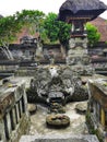 Stone-carved figures and decorations at balinese hindu temple on Bali island in Indonesia