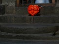 Stone carved Kirtimukha at steps to temple at Pataleshwar shiva temple Pune