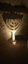 A stone-carved menorah in ancient Jewish burial catacombs located in Beit She\'arim National Park